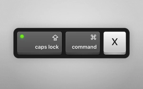 An example of a keystroke visualization: in this case, Caps Lock, Command, and X. The colors shown are suitable for macOS’s light theme.